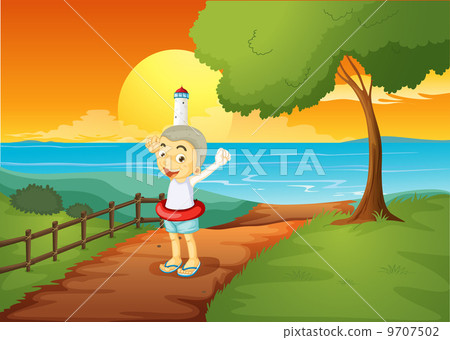 A young boy standing across the lighthouse A young boy standing across the lighthouse 9707502