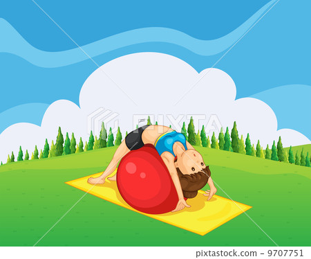 A young girl exercising with a bouncing ball at the hilltop A young girl exercising with a bouncing ball at the hilltop 9707751
