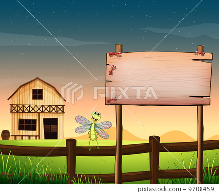 An empty wooden board near the fence with a dragonfly 9708459