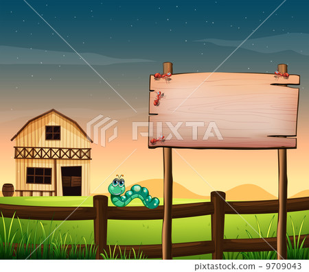 An empty wooden board across the barnhouse at the hilltop 9709043
