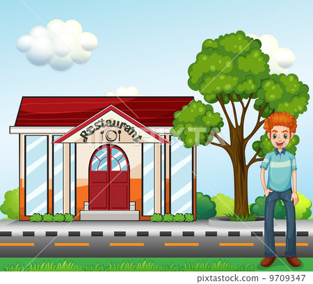 A man standing near the restaurant A man standing near the restaurant 9709347