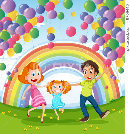 A happy family near the rainbow and balloons 9709440