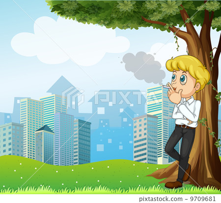A boy smoking under the tree across the buildings A boy smoking under the tree across the buildings 9709681