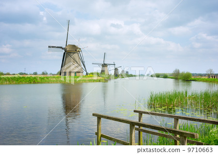 dutch windmills in summer day dutch windmills in summer day 9710663