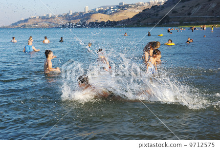 Swimming in lake Kinneret 9712575