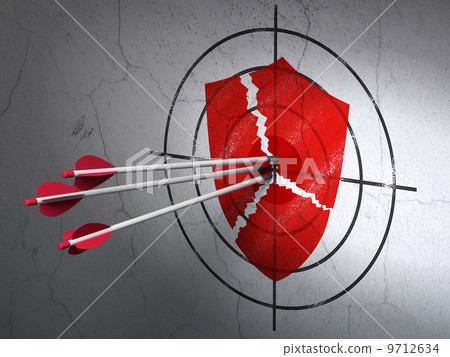 Safety concept: arrows in Broken Shield target on wall background Safety concept: arrows in Broken Shield target on wall background 9712634