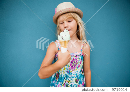 Young girl holding ice cream Young girl holding ice cream 9719014