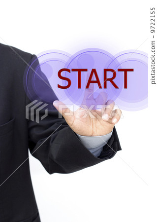 Business person pushing symbols on a touch screen 9722155