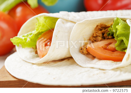 burritos with beef tomato and salad leaf burritos with beef tomato and salad leaf 9722575