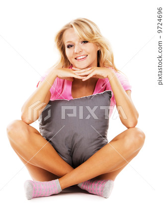 Lovely girl with a pillow 9724696