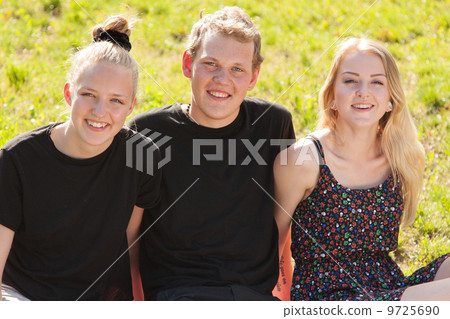 Students having fun in a park 9725690
