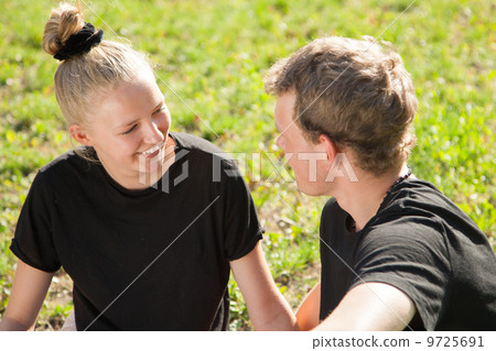 Students having fun in a park 9725691