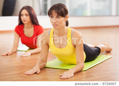 Group training in a fitness center Group training in a fitness center 9726007