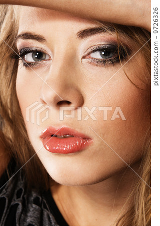 Young beautiful woman face portrait 9726326