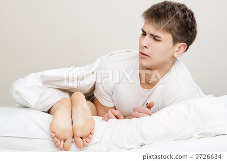 Young couple in bed Young couple in bed 9726634