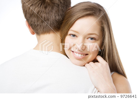 Beautiful girl leaning on boyfriend's shoulder 9726641