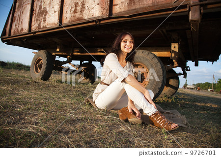 Gorgeous woman in countryside 9726701