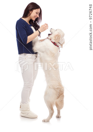 Beautiful young woman with a dog 9726748