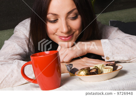 Beautiful lady drinking tea Beautiful lady drinking tea 9726948