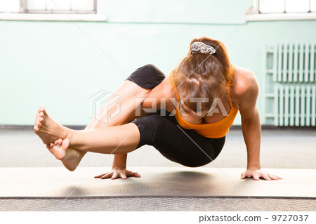 Mature woman exercising yoga Mature woman exercising yoga 9727037