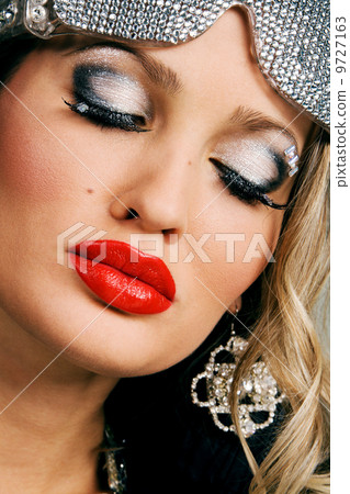 Alluring young woman with creative makeup Alluring young woman with creative makeup 9727163