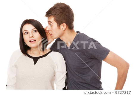 Young couple gossiping Young couple gossiping 9727217