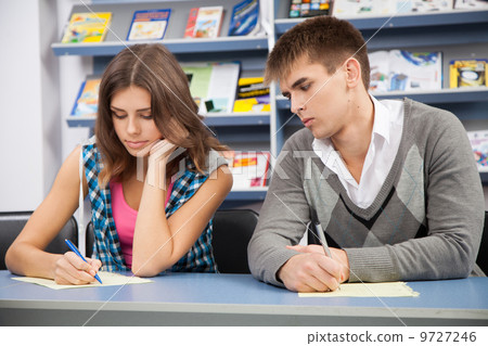 Student cheating at test exam Student cheating at test exam 9727246