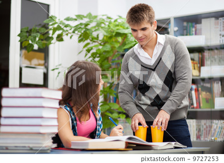Students in a library 9727253