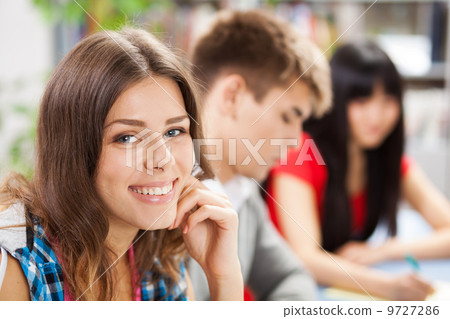 Group of students in a classroom Group of students in a classroom 9727286