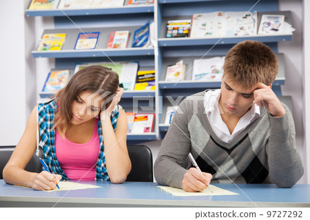 Student cheating at test exam 9727292