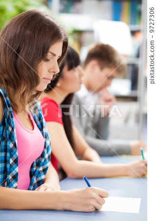 Group of students in a classroom Group of students in a classroom 9727306