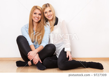 Two female friends having fun Two female friends having fun 9727309