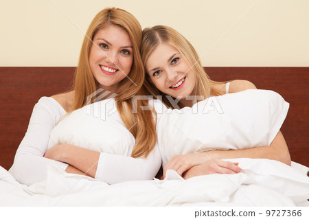 Two beautiful women in bed Two beautiful women in bed 9727366