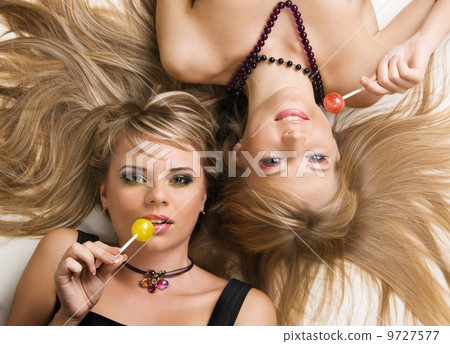 Two beautiful girls with bright makeup Two beautiful girls with bright makeup 9727577