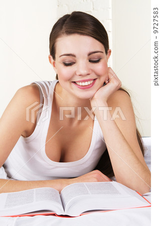 Reading in bed Reading in bed 9727583