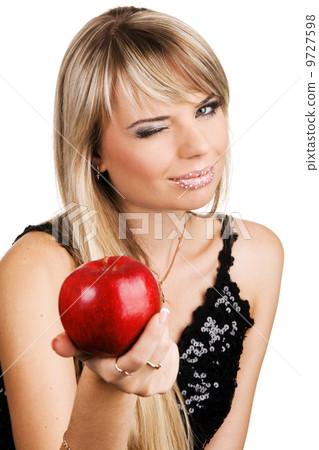 Young woman giving an apple 9727598