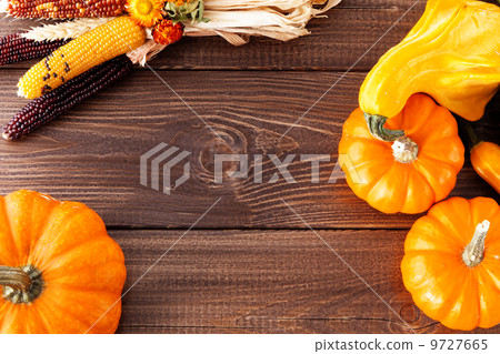 Fresh pumpkins on a wooden table Fresh pumpkins on a wooden table 9727665