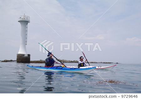 Sea kayak and Morito coastal scenery 9729646