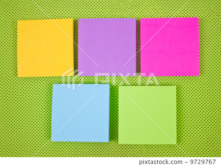 Colorful sticky notes on green fabric background. Colorful sticky notes on green fabric background. 9729767