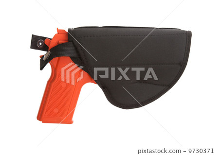 Dirty red training gun isolated on white Dirty red training gun isolated on white 9730371