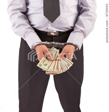 Business man in handcuffs arrested for bribe Business man in handcuffs arrested for bribe 9730443