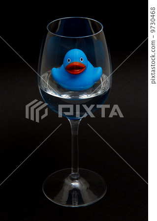 Blue rubber duck in a wineglass Blue rubber duck in a wineglass 9730468