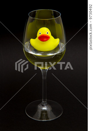Yellow rubber duck in a wineglass Yellow rubber duck in a wineglass 9730492