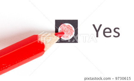 Red pencil choosing between yes or no 9730615