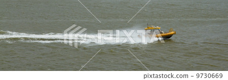 Yellow Crewtender at high speed 9730669