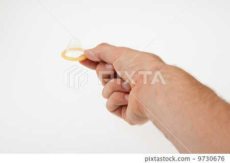 Male giving a condom 9730676