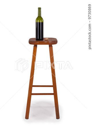 Old stool and bottle of wine isolated Old stool and bottle of wine isolated 9730869