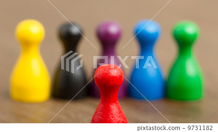 Six colored pawns isolated 9731182