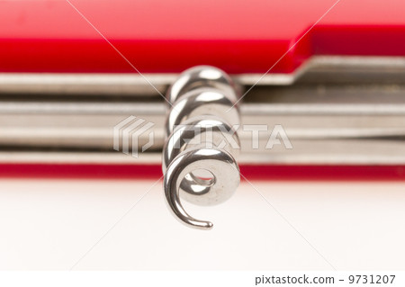Red swiss army knife isolated, focus on corkscrew Red swiss army knife isolated, focus on corkscrew 9731207