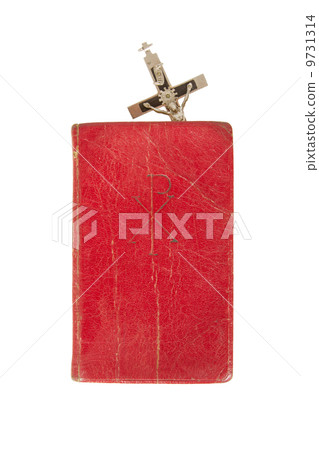 Old antique bible and cross on a white background Old antique bible and cross on a white background 9731314